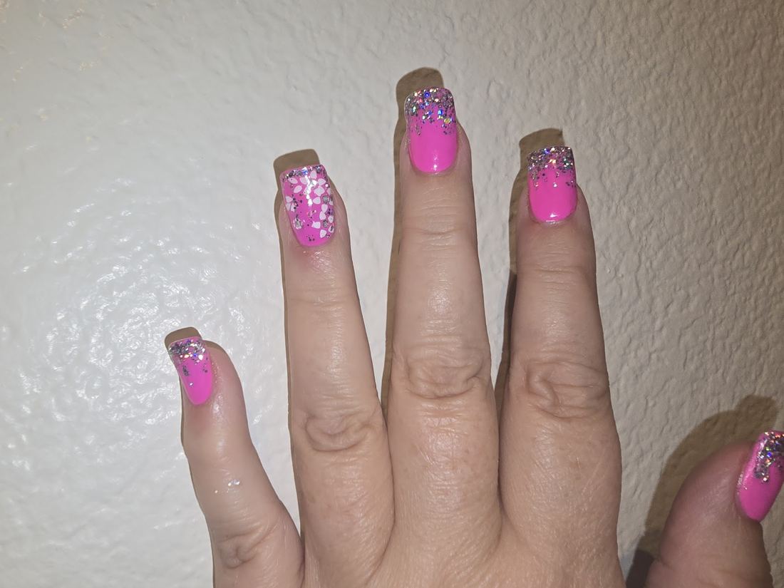 Hot pink nails with glitter accent nails