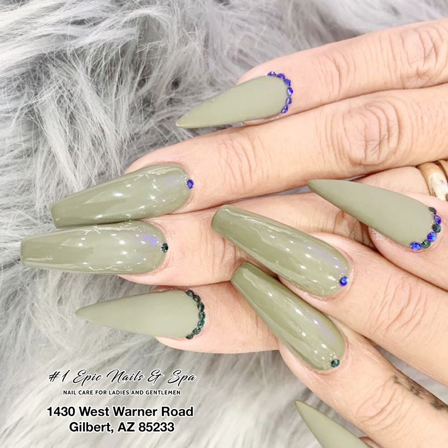 Long sage green coffin nails with blue rhinestone accents