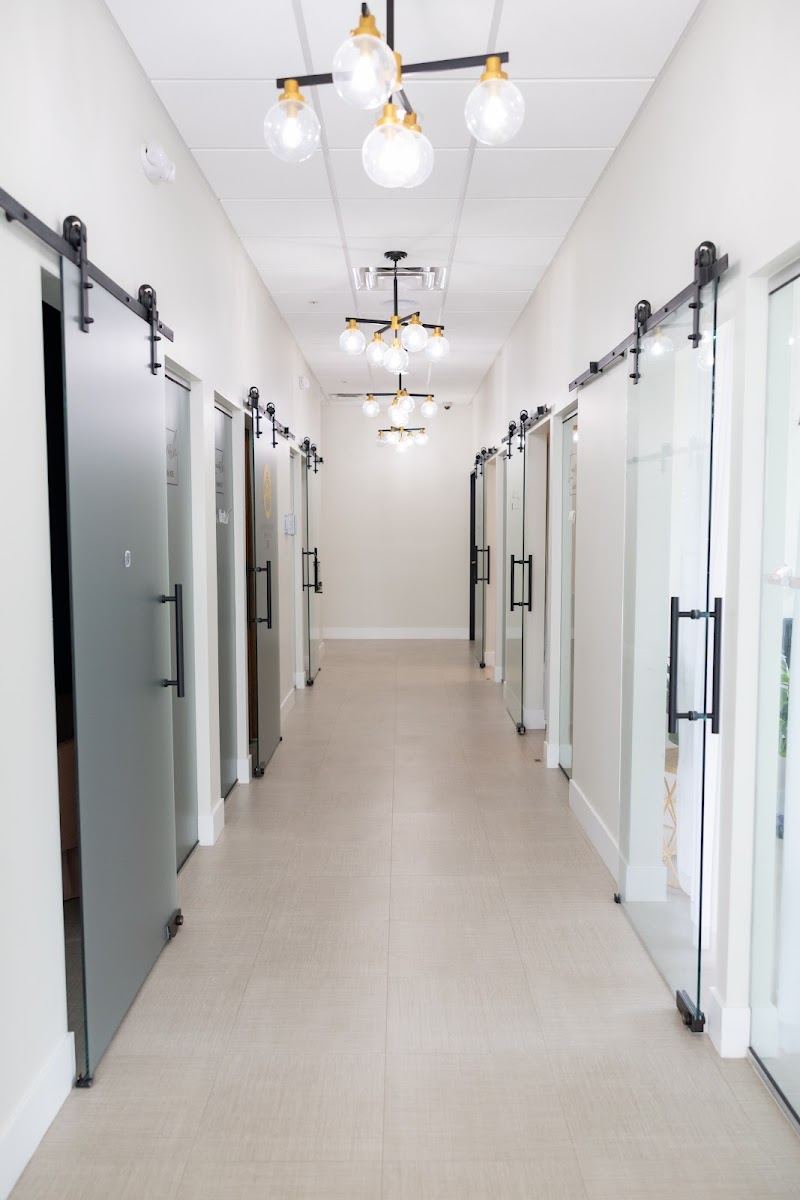 Bright hallway of private studio suites at Lavish Studios