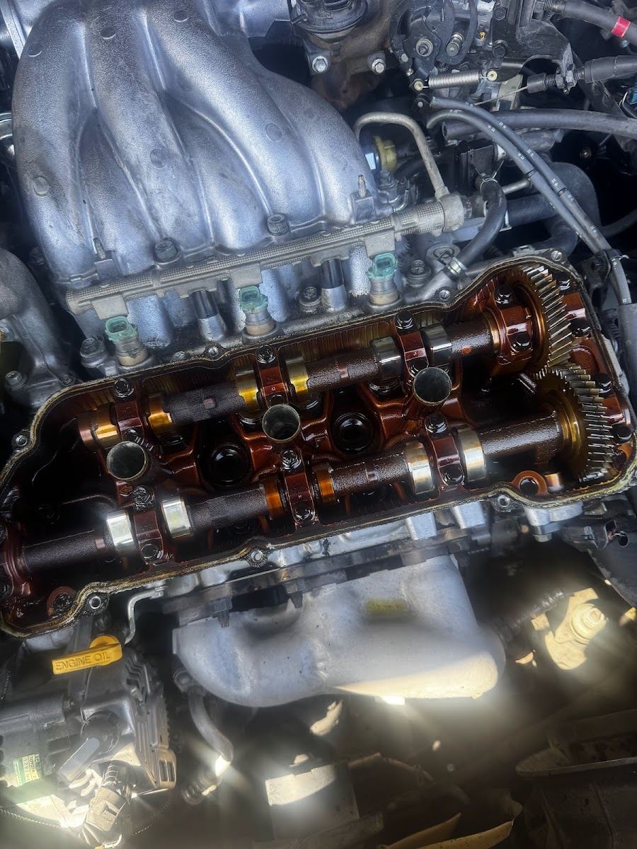 Engine with the valve cover off showing camshafts