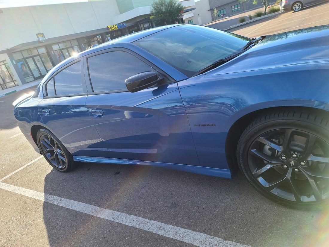 Blue sedan with tinted windows