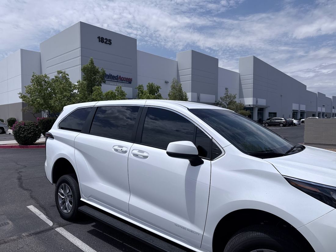 White minivan with tinted rear windows