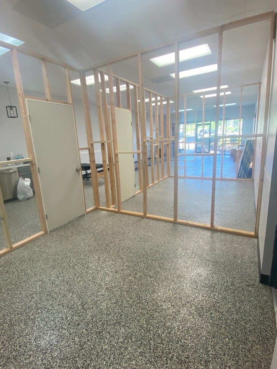 New wood stud framing for interior walls in an open room