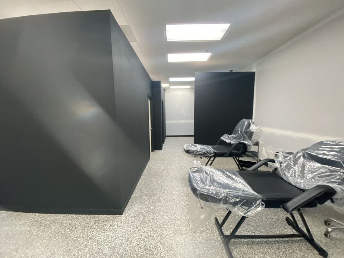 Freshly painted black walls in a commercial room