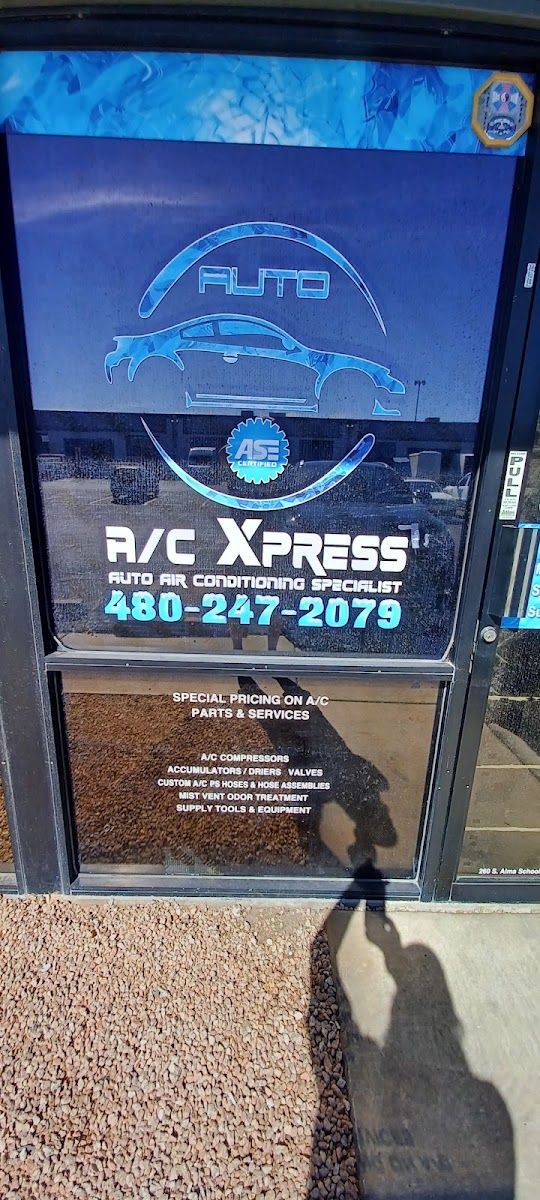 Auto A/C Xpress front door decal in icy blue with the shop phone number