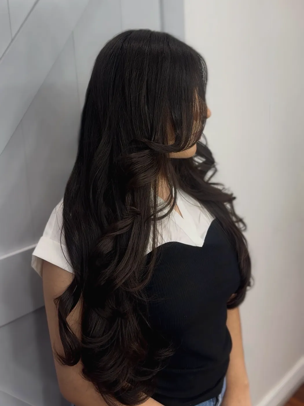 Long black hair with bouncy layers