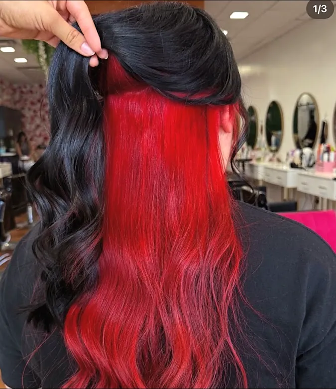 Black hair with a bright red underneath section
