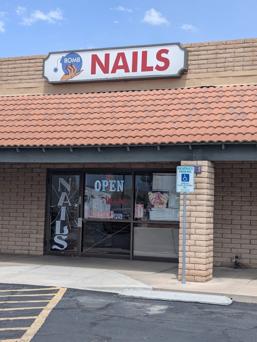 Bomb Nails storefront with the red NAILS sign on W Baseline Rd