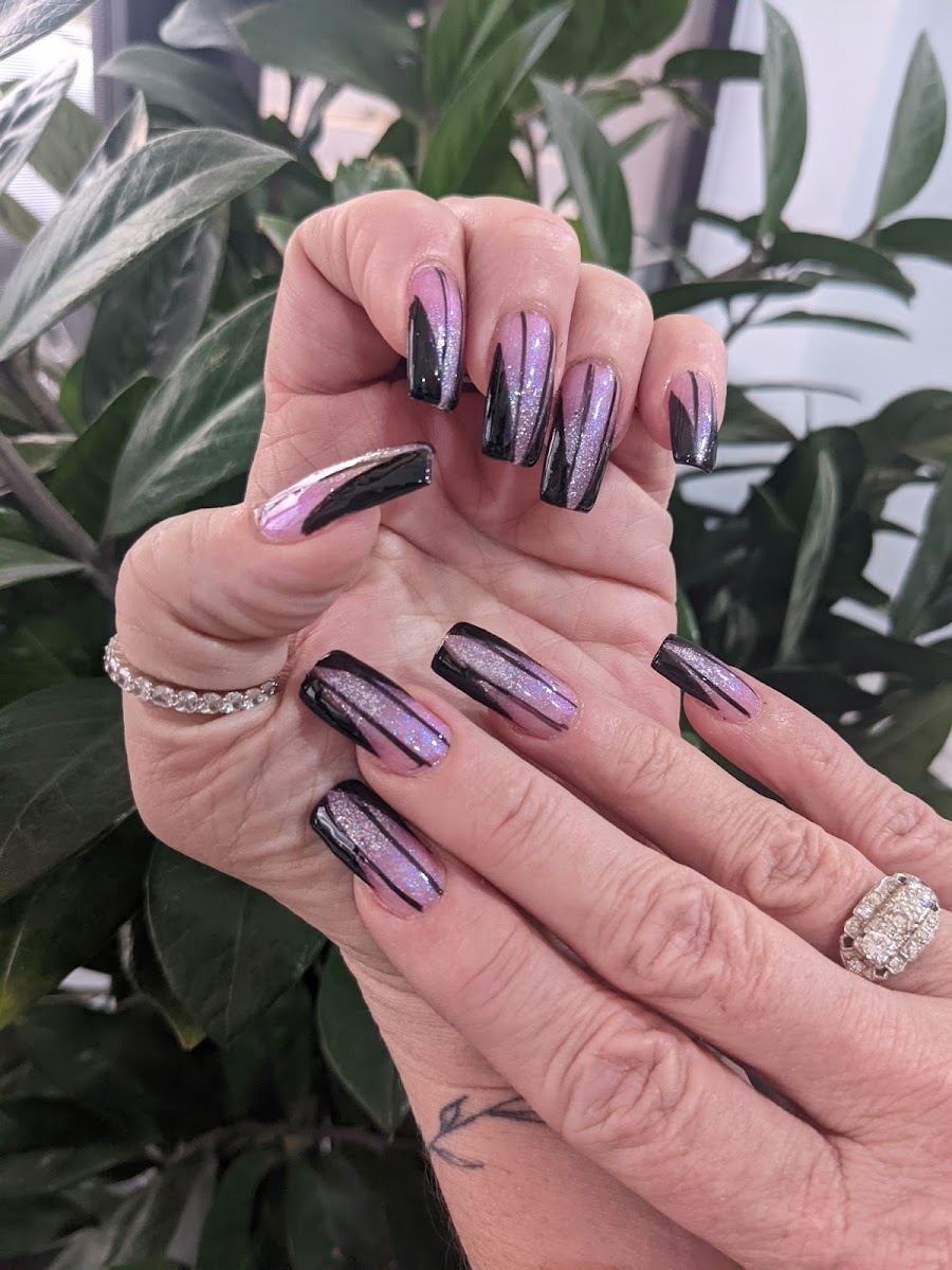 Black nails with pink and purple glitter fade