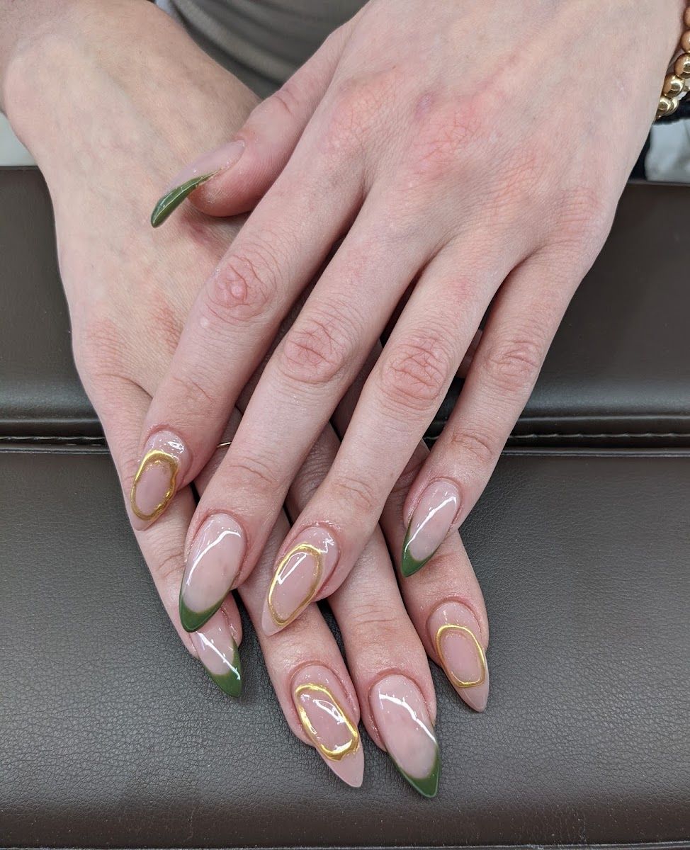 Almond nails with gold outline and green French tips