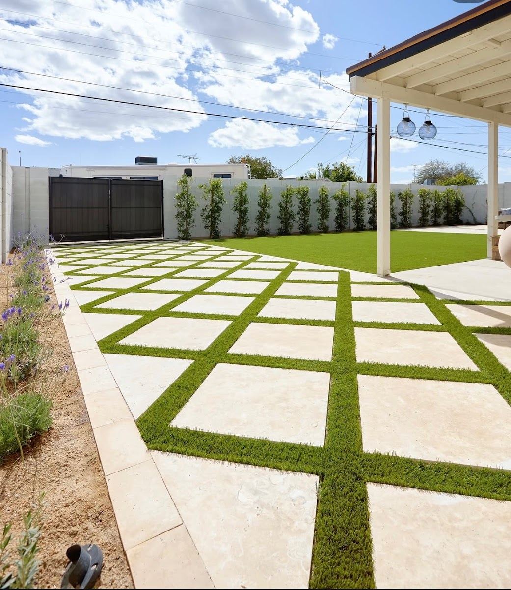Large pavers set in a grid with turf joints