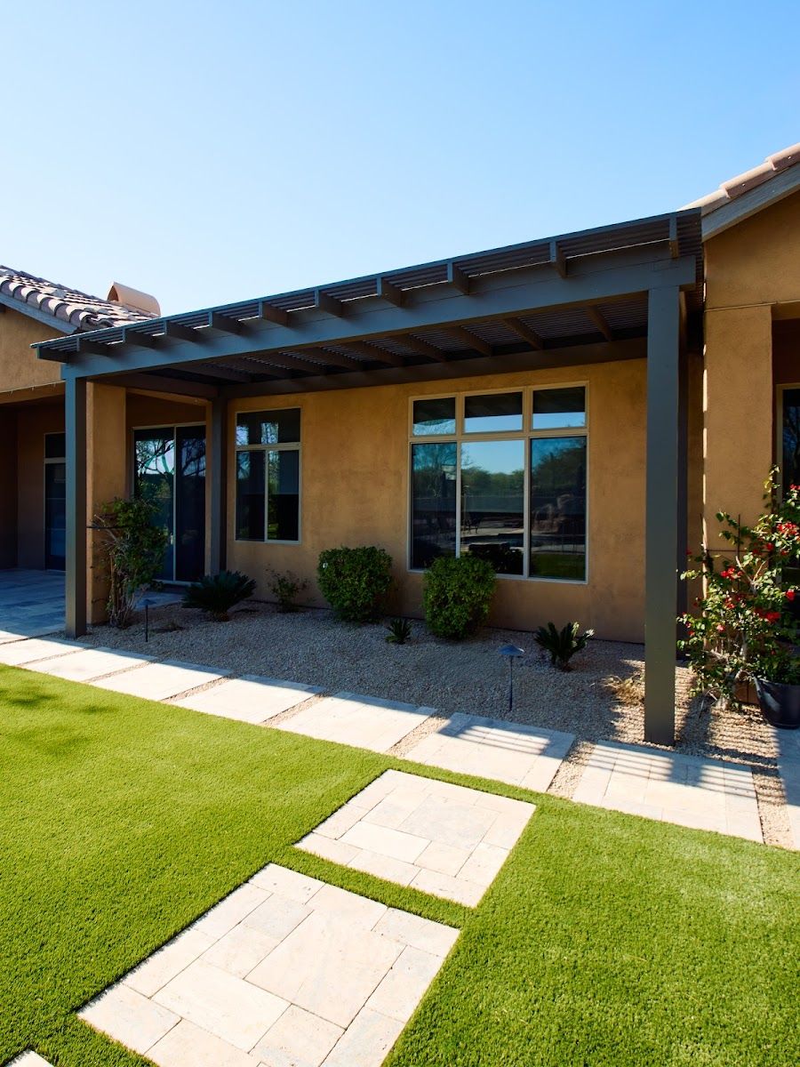 Paver stepping path through a fresh turf lawn