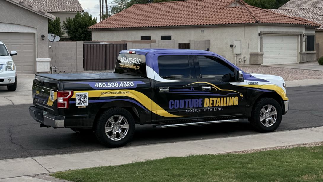 The Couture Detailing truck in its black, gold and violet wrap