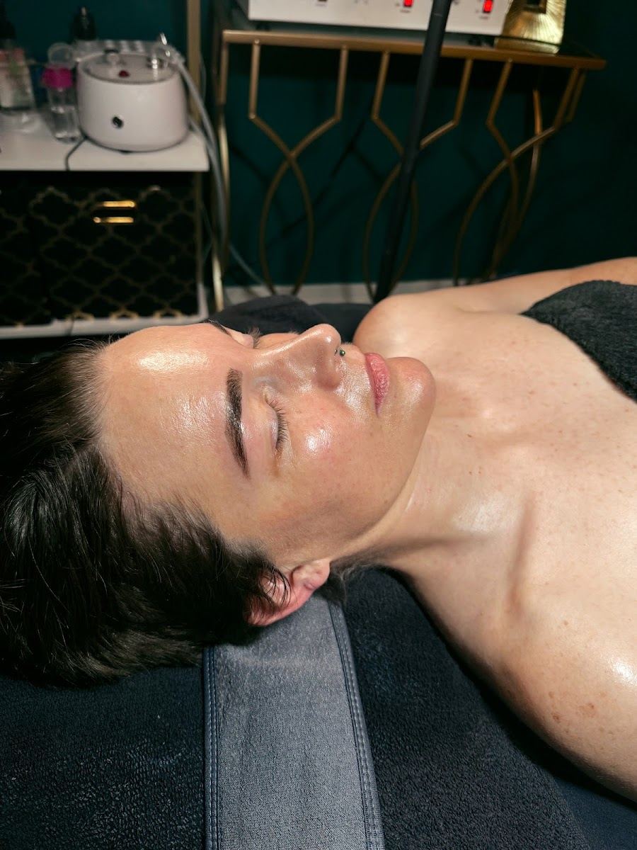 A client resting with eyes closed during a facial