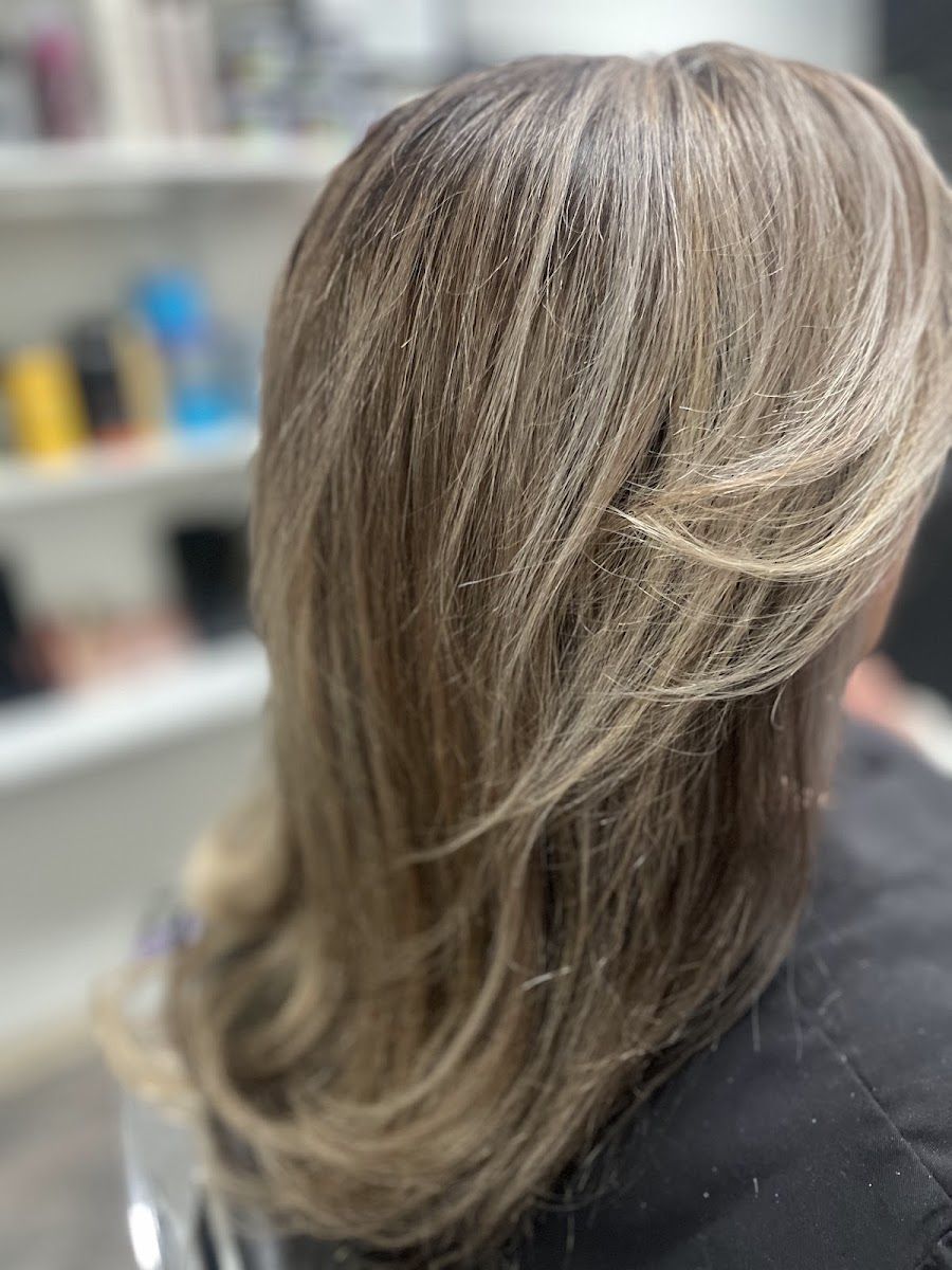 Caramel and blonde layered cut with face framing