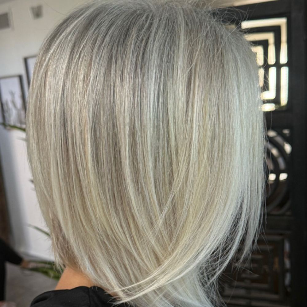 Smooth silver blonde blended hair, finished straight