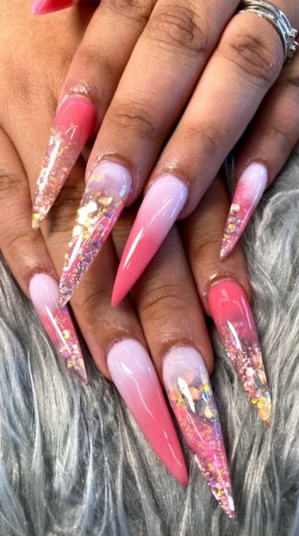 Long pink ombre stiletto nails with encapsulated glitter