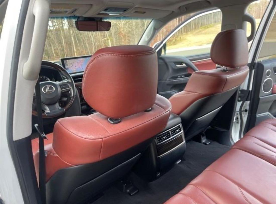 Red leather seats cleaned and conditioned