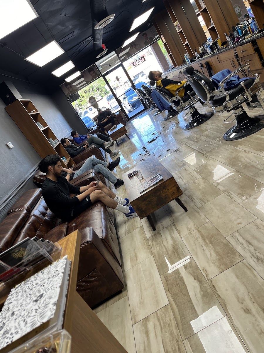Clients waiting on the leather bench by the front windows