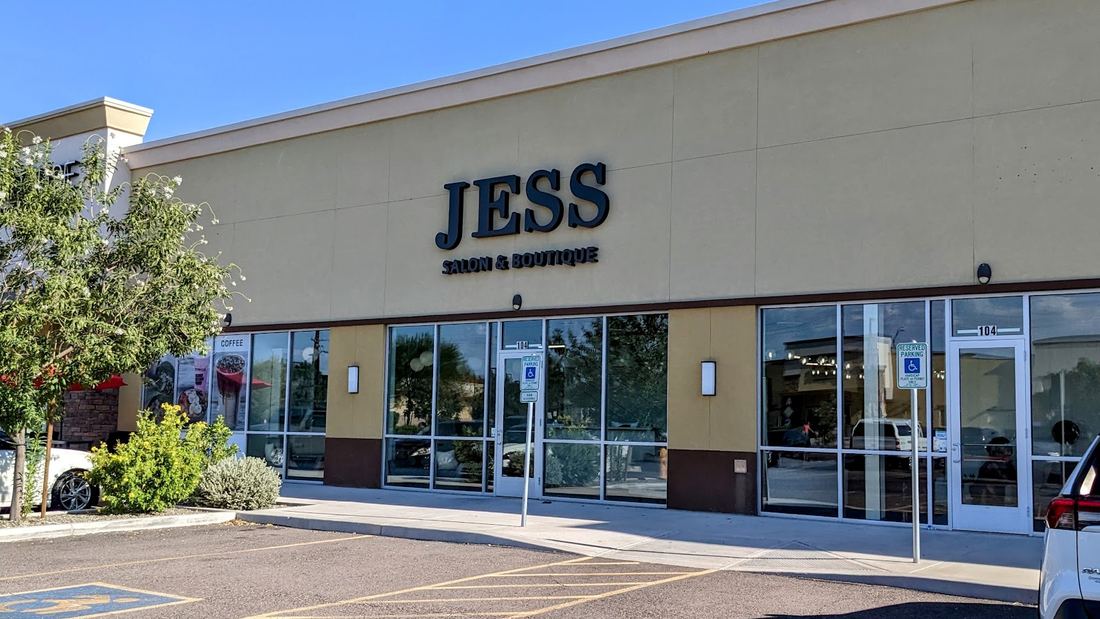 Jess Salon & Boutique storefront with the navy JESS sign on E Pecos Rd