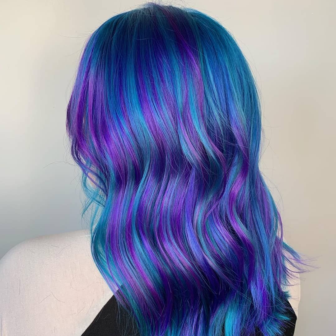 Long wavy hair in vivid blue and violet