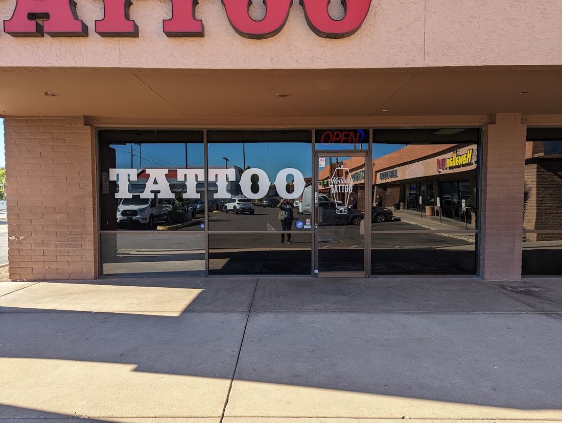 The Mortuary Tattoo storefront with TATTOO lettering on the windows