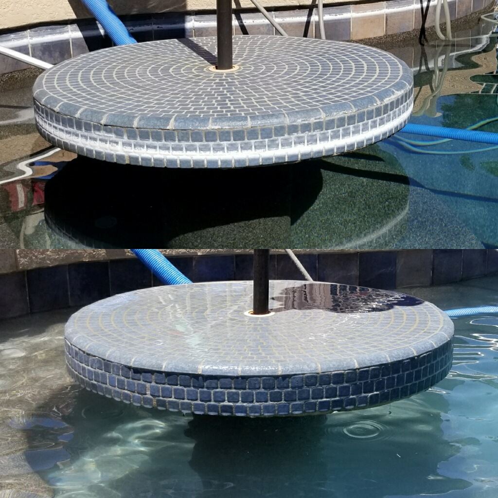 Round tiled pool table under an umbrella, calcium covered before and clean after