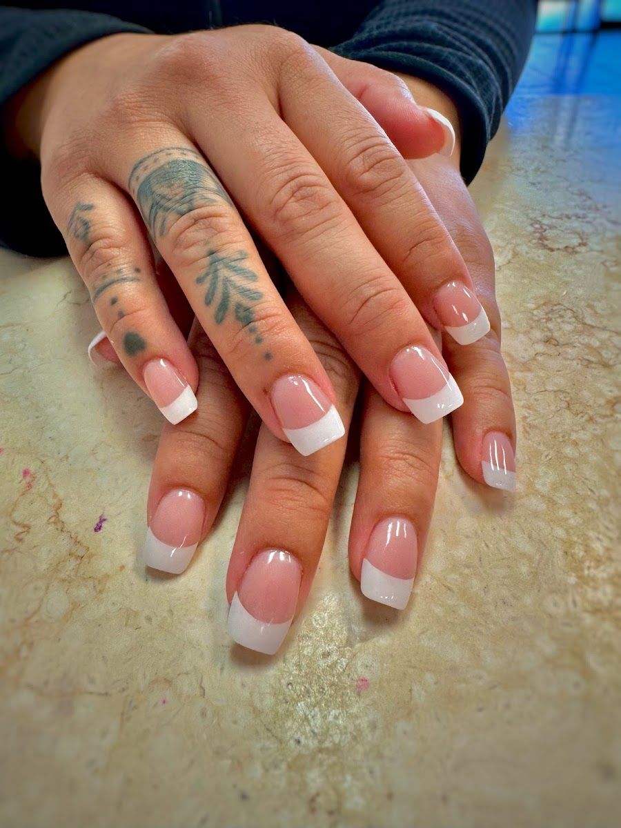 Square nails with a classic pink and white French finish