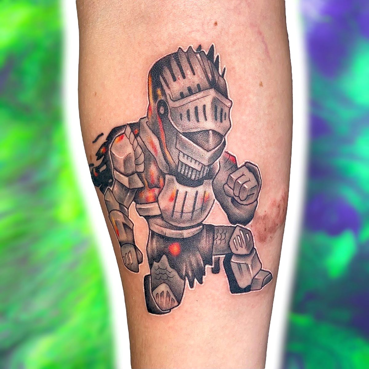 Chunky armored knight with glowing red cracks, on a forearm