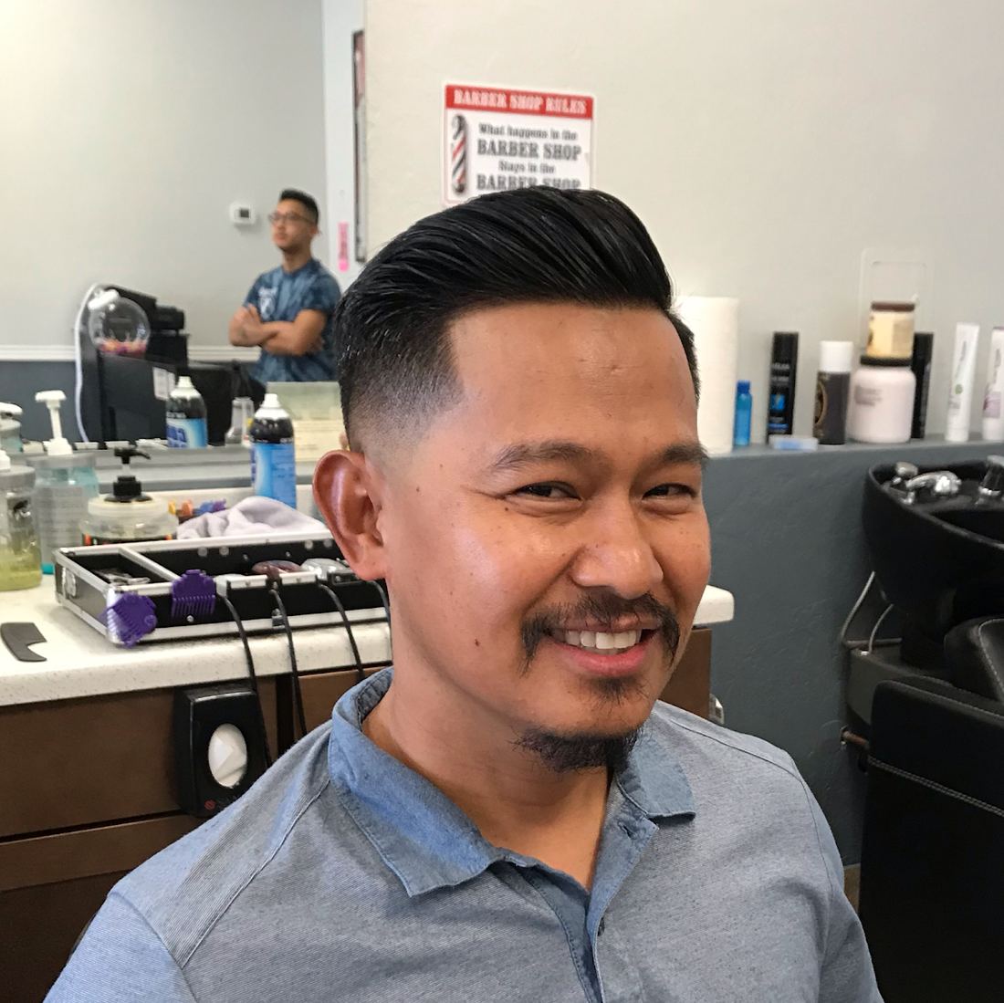 Smiling client with a fresh taper and combed top