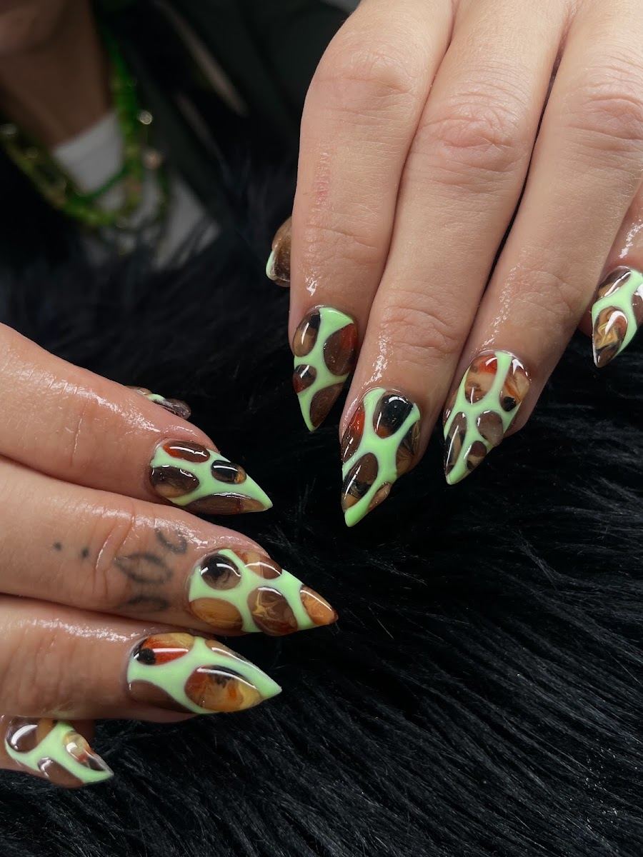 Sage green and brown abstract stiletto nails