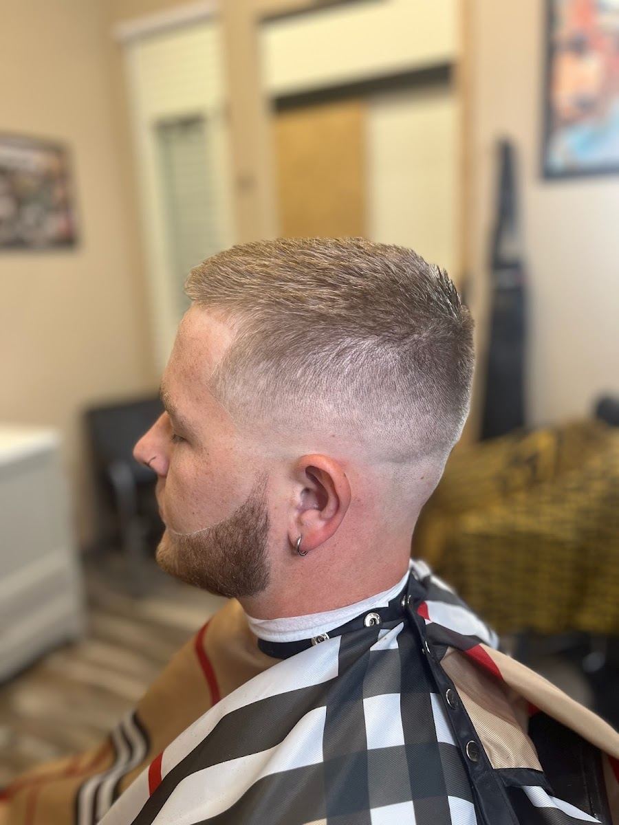 Short textured crop with a skin fade and trimmed beard