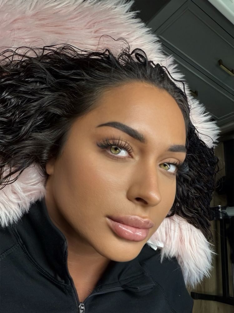 Client with laminated brows and soft lash extensions