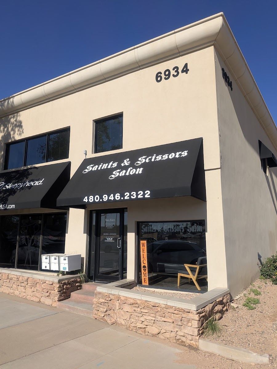 Saints & Scissors Salon storefront with black awning at 6934 E 5th Ave
