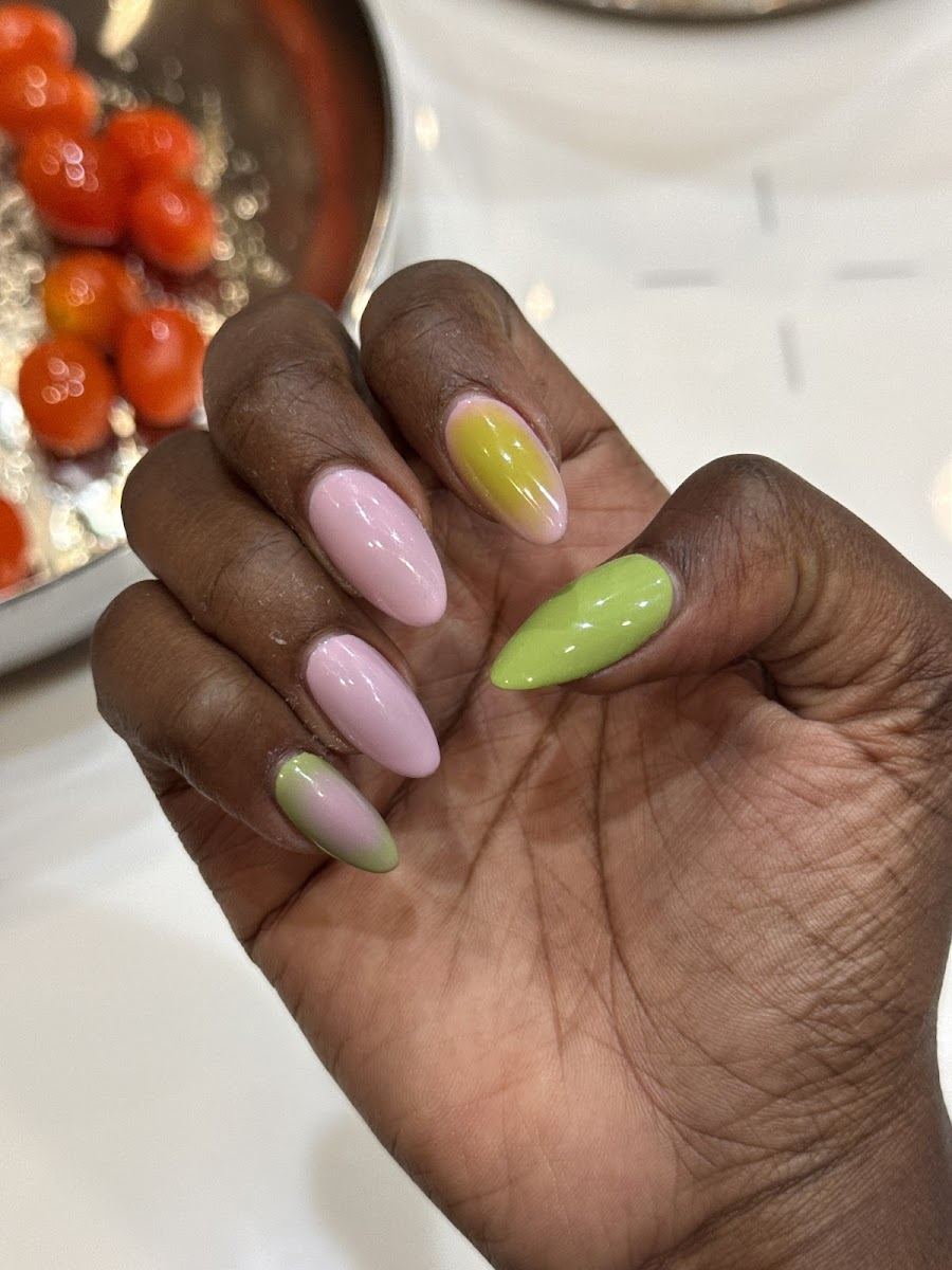 Almond nails in soft pink with lime green and ombre accents