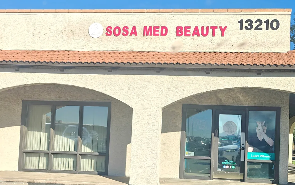 The storefront: hot pink SOSA MED BEAUTY letters and the number 13210 above a red tile roof and stucco arches