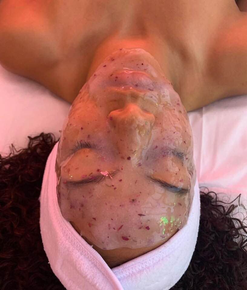 Client relaxing in a face mask during a studio treatment