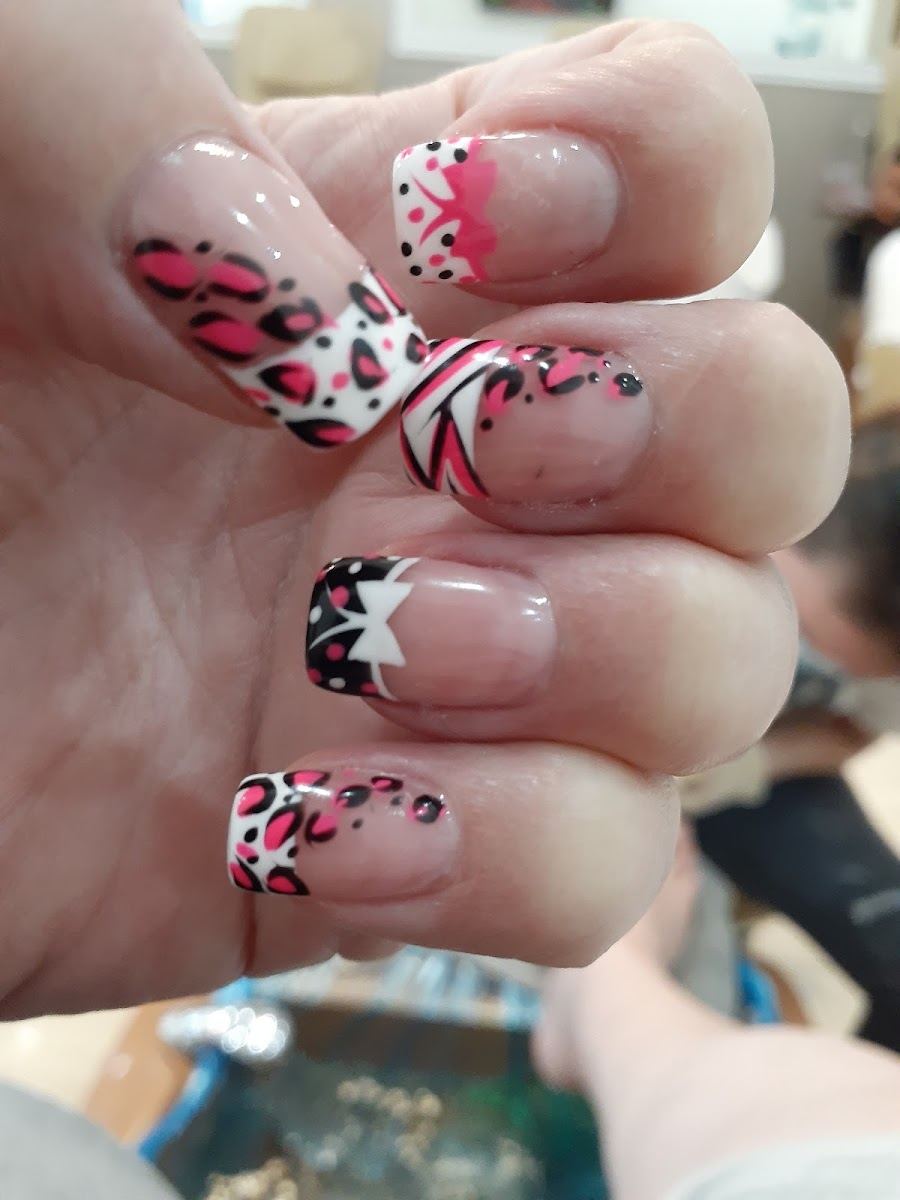 Clear tips with hot pink leopard print, polka dots and bow details