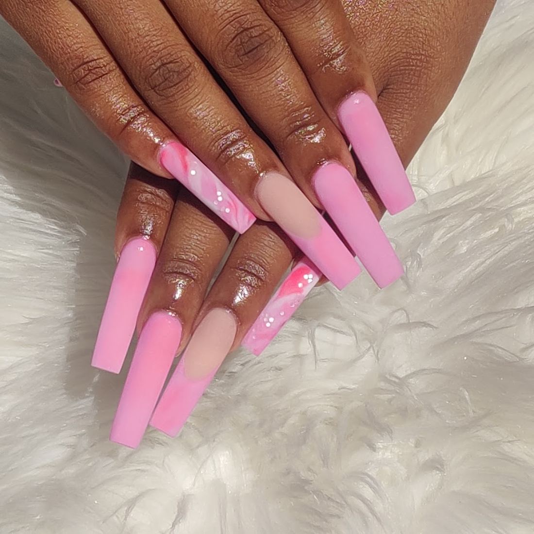 Long pink square acrylics with a faded pink accent design