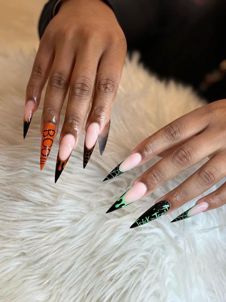 Halloween stiletto set with black tips, orange BOO lettering and green webs