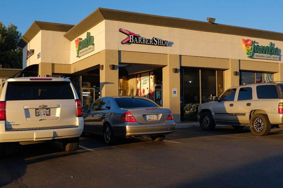 Trnd Setters Barbershop storefront on Dobson Road in Mesa at golden hour